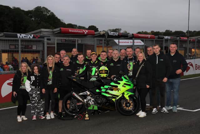 Northern Ireland's James McManus celebrates his British Junior Supersport title win with the Completely Motorbikes/Affinity Sports Academy Kawasaki team and his family and friends at Brands Hatch. Picture: Bonnie Lane