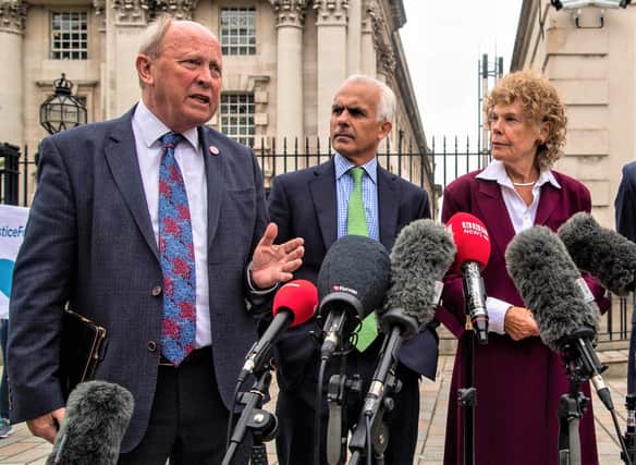 TUV MLA Jim Allister at Belfast High Court, with Ben Habib (centre) and Kate Hoey