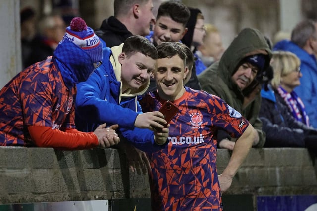 Linfield's Joel Cooper poses for selfies after scoring his sixth goal in three matches