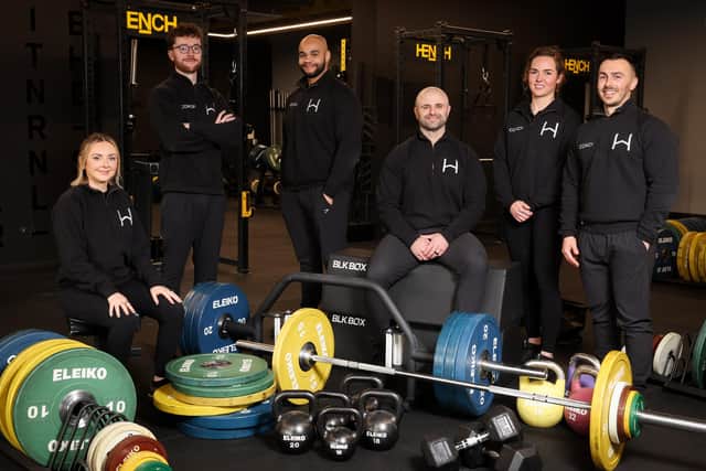 The Hench team, including founder Rory Girvan and head strength Coach Conor Johnson, at their new premises on Cromac Street, Belfast