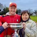 Mike Orchin-McKeever celebrates Ballyclare's All Ireland Junior Cup win with his parents, Michael and Lorna. (Photo by Ballyclare RFC)
