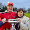 Mike Orchin-McKeever celebrates Ballyclare's All Ireland Junior Cup win with his parents, Michael and Lorna. (Photo by Ballyclare RFC)