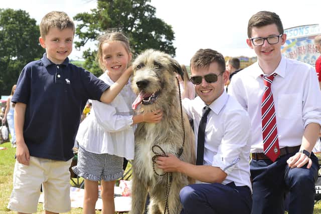 Will and Georgia Gardiner with their dog Carson, Calum Guiney and Andrew Devlin. Pic: Arthur Allison/Pacemaker Press.