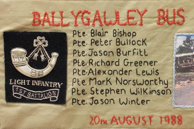Part of the SEFF patchwork quilt listing the soldiers who were murdered in the Ballygawley Bus bomb