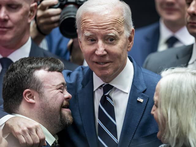 US President Joe Biden embraces James Martin, who starred in the recent oscar winning short film 'An Irish Goodbye', as he visits Ulster University in Belfast, to give a keynote speech, during his visit to the island of Ireland. Picture date: Wednesday April 12, 2023.