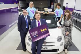 Iconic City Car Fiat 500 worth over £5,000 to be auctioned in aid of automotive charity Ben thanks to support from City Auction Group at Northern Ireland Motor Industry Awards 2024. Pictured is Stephen Kelly, chief executive officer at Used Cars NI, Michael Tomalin, chief executive at City Auction Group, Sasha Jeffrey, director of PR & Events at ASG & Partners and two fundraising representatives for Ben