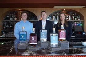 The Salthouse Hotel in Ballycastle, one of Europe’s most sustainable accommodation providers, has launched its latest venture in collaboration with Basalt Distillery, The Salthouse Spirits Range. Pictured is James Richardson, Basalt Distillery, Carl McGarrity, The Salthouse Hotel and Martha Garbe, Basalt Distillery