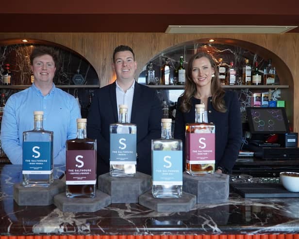 The Salthouse Hotel in Ballycastle, one of Europe’s most sustainable accommodation providers, has launched its latest venture in collaboration with Basalt Distillery, The Salthouse Spirits Range. Pictured is James Richardson, Basalt Distillery, Carl McGarrity, The Salthouse Hotel and Martha Garbe, Basalt Distillery