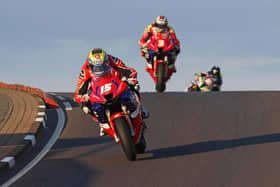 Nathan Harrison leads his Honda Racing UK team-mate John McGuinness in the Superstock race at the North West 200 on Thursday evening