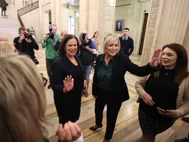 Sinn Fein president Mary Lou McDonald (centre) and vice-president Michelle O'Neill, wave after speaking to students from Mount Lourdes Grammar in Enniskillen, after addressing media today in the Great Hall at Stormont, Belfast