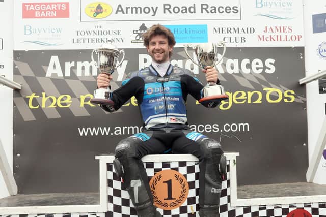 Mike Browne pictured with the Man of the Meeting award and the Race of Legends trophy after winning the feature Superbike event at Armoy. (Photo by Stephen Davison/Paemaker Press)