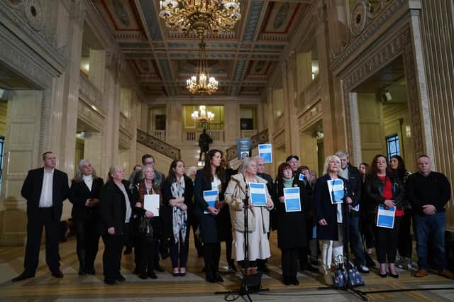 members of victims' group Savia, speaks to the media in the Great Hall at Stormont after proceedings where the long-awaited public apology to the victims of historical institutional abuse was given
