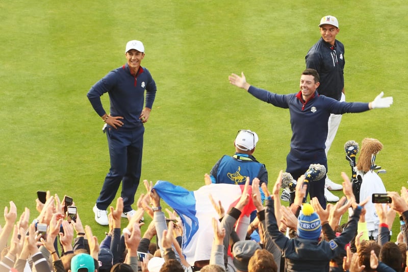 Rory McIlroy encouraging the fans on the first tee at Le Golf National in France. (Photo by Jamie Squire/Getty Images)