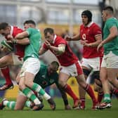 Ireland's Robbie Henshaw tackles Wales' George North during the Guinness Six Nations match at the Aviva Stadium in Dublin, Ireland