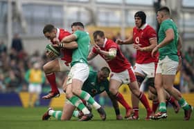Ireland's Robbie Henshaw tackles Wales' George North during the Guinness Six Nations match at the Aviva Stadium in Dublin, Ireland