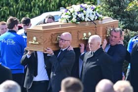 Family and friends attend the funeral of Ben Gillis at Ballymore Parish Church in Tandragee on Sunday.