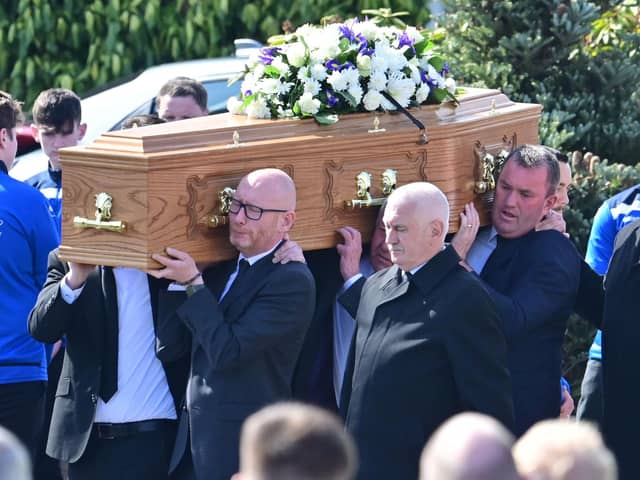 Family and friends attend the funeral of Ben Gillis at Ballymore Parish Church in Tandragee on Sunday.