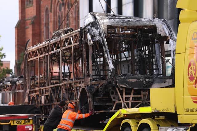 A man accused of a knife attack that sparked rioting in Northern Ireland has plead not guilty to all charges facing him and is set to stand trial in February.