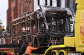 A man accused of a knife attack that sparked rioting in Northern Ireland has plead not guilty to all charges facing him and is set to stand trial in February.