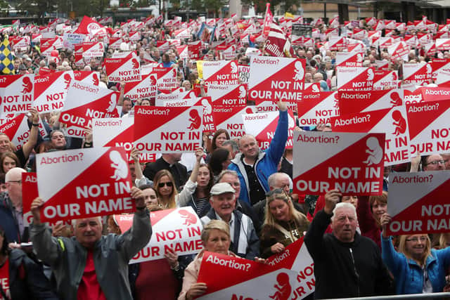 Crowds of people in Belfast taking part in a rally against Westminster liberalising abortion legislation in Northern Ireland.