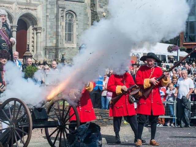 Cano fire under the watchfull eyes of Governor Walker during the Pageant which tells the story of the Siege of Londonderry which took place from 1688 to 1689 and lasted 107 days. The event, held ahead of the annual Apprentice Boys Relief of Derry parade on saturday in which 7000 members of the organisation took part accompanied by 144 bands and marked the end of the week long Maiden City Festival. Picture Martin McKeown. Inpresspics.com. 09.08.14