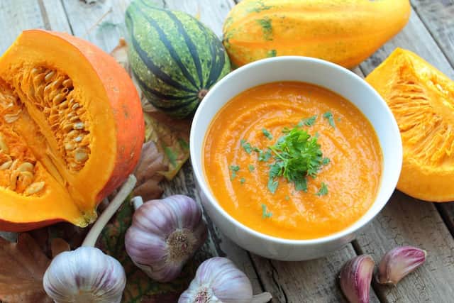 Pumpkin cream soup with pumpkins and garlic