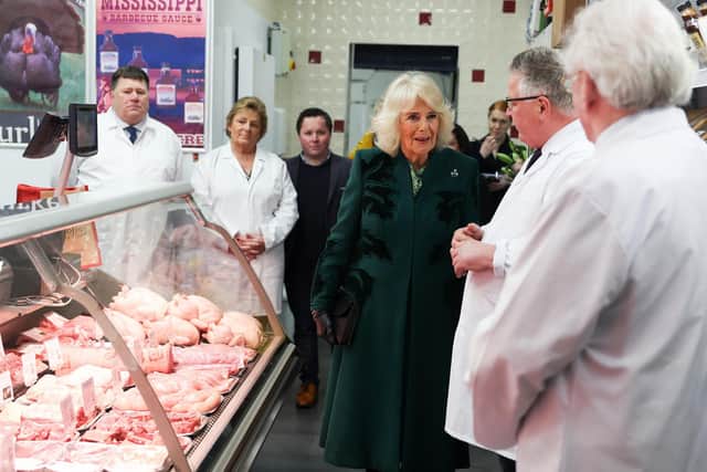 Her Majesty The Queen visits Coffey’s Butchers on the Lisburn Road in Belfast, where she was gifted beef sausages, vegetable roll and Tayto cheese and onion crisps. Photo by Jonathan Porter/Press Eye