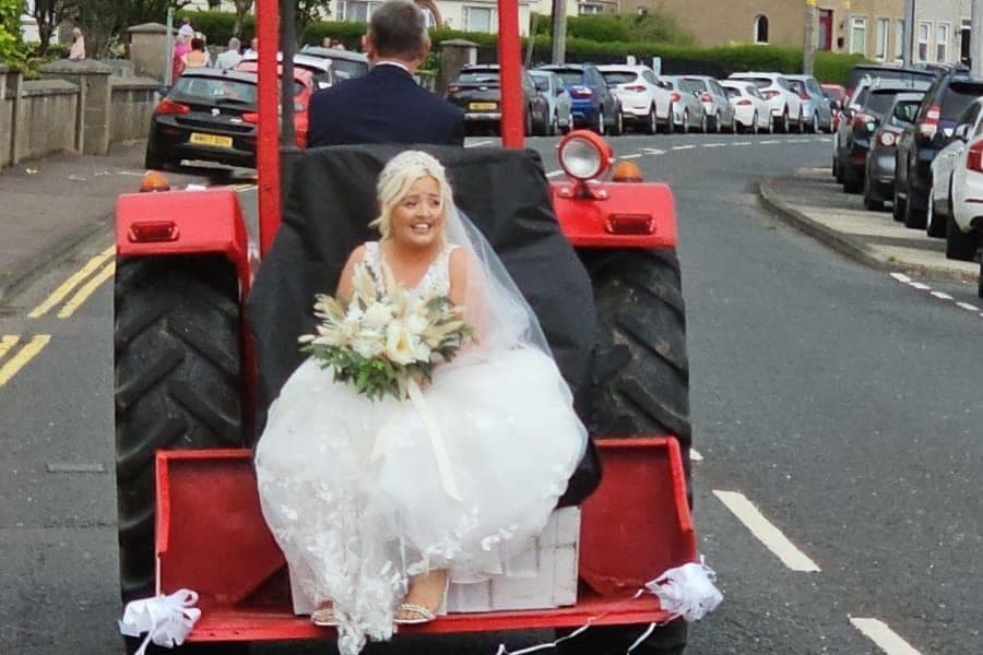 Bride's 'heart is full' after outpouring of praise for travelling to the chapel behind her father's vintage tractor