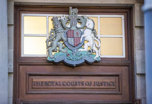 The crest of the Royal Courts of Justice where the High Court and the Court of Appeal sit in Belfast. The Department of Justice (DoJ) said that any withdrawal of services by criminal barristers in the region risks “adversely impacting” those who need legal representation.