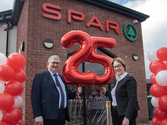 Well-known local retailers, Charlie and Ruth Hamilton are celebrating 25 years serving the local community from their Tamlaght Road Spar. Pictured are Charlie and Ruth Hamilton celebrate their 25 year milestone (Jason McCartan Photography)