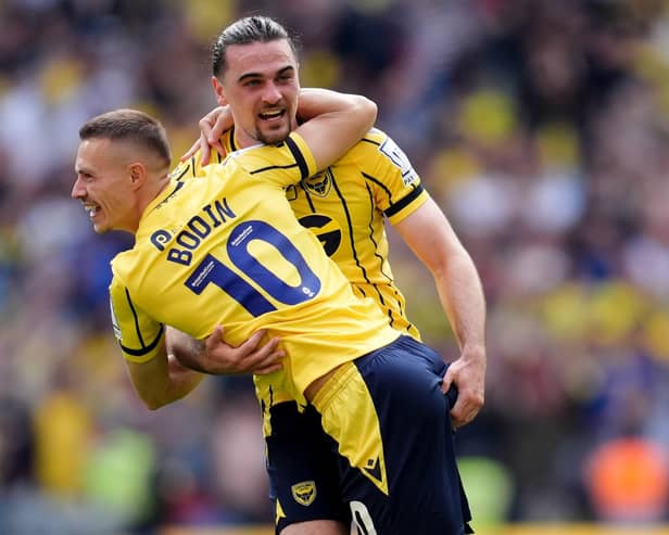 Northern Ireland international Ciaron Brown (right) celebrates with Oxford United team-mate Billy Bodin after success over Bolton Wanderers at Wembley in the Sky Bet League One play-off final. (Photo by Adam Davy/PA Wire)