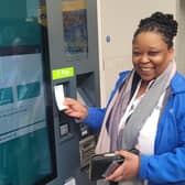 Debra Leso was the first passenger to purchase her ticket from the new self-serve ticket vending machine at the newly opened York Street Station
