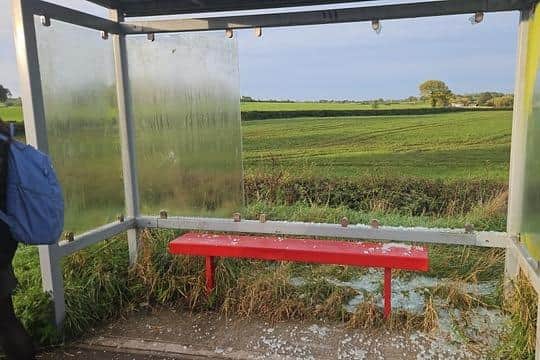 Not only is the bus always late, parents say, but the bus stop has been so badly smashed that they have no protection from the elements when waiting.