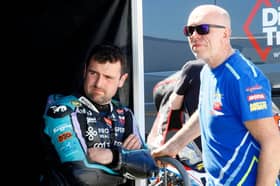 Michael Dunlop with John Burrows at the Cookstown 100 on Friday. Dunlop won the red-flagged Open Superbike race on his BMW. (Photo by  Rod Neill Pacemaker Press)