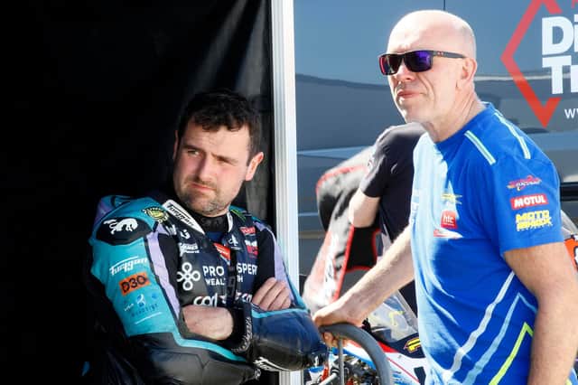 Michael Dunlop with John Burrows at the Cookstown 100 on Friday. Dunlop won the red-flagged Open Superbike race on his BMW. (Photo by Rod Neill Pacemaker Press)