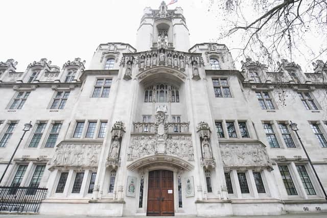The UK Supreme Court in Parliament Square, central London. A judgement will be delivered on Wednesday over whether men who identify as transgender can be regarded as female for the purposes of the 2010 Equality Act.