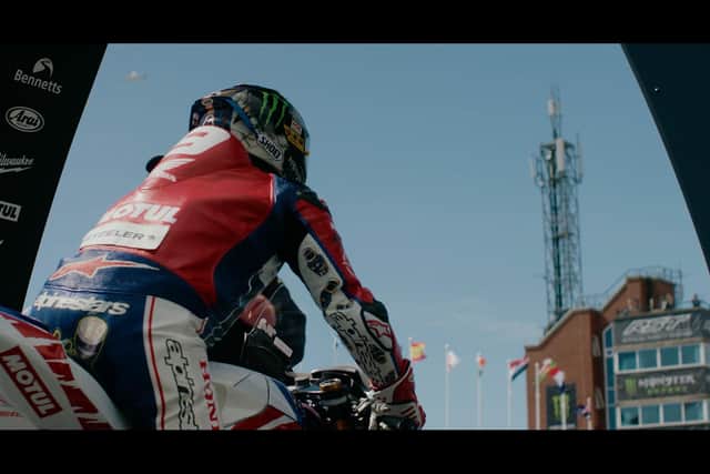 John McGuinness in a still from Tourist Trophy. The Morecambe man and 23-time winner made his 100th TT start in the Superbike race this year.