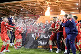 Portadown's players celebrate after receiving the Playr-Fit Championship trophy following this evening's game at Shamrock Park, Portadown. PIC: David Maginnis/Pacemaker Press