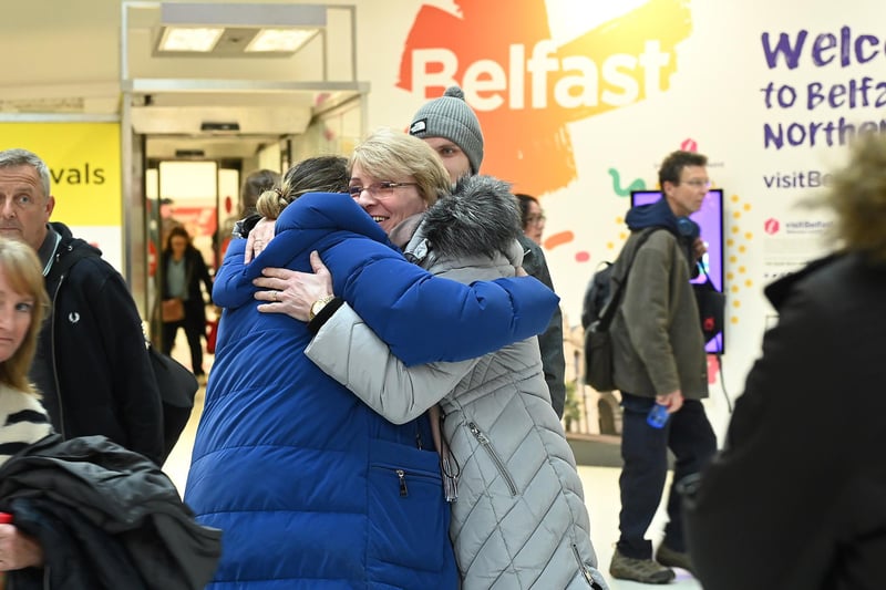 As Santa's arrival draws ever closer, friends and families were reunited at arrivals back home in Northern Ireland.  Families reunited for Christmas at George Best Belfast City Airport today
Picture By: Arthur Allison: PacemakerPress.:-
