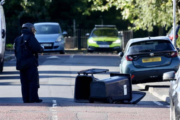 A soldier in a bomb suit at the scene of the explosion this morning
