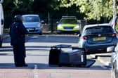 A soldier in a bomb suit at the scene of the explosion this morning