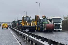 Fuel protestors slowly driving tractors and heavy vehicles, blocking the Sydenham Bypass city-bound close to Belfast City Airport (picture: Michael Cooper)