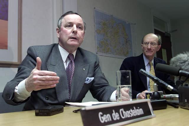 General John de Chastelain (left), head of the international decommissioning body for weapons, with Andrew Sens, speaking in Belfast. de Chastelain wanted to walk away from the decommissioning process in 2002 as they were four years at it and could not see themselves going any further.