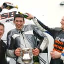 Derek Sheils, a three-time winner of the Enkalon Trophy, celebrates his maiden success in 2004 with runner-up Michael Swann and Darran Lindsay at Aghadowey. (Photo by Stephen Davison/Pacemaker Press)