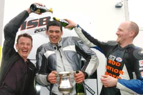Derek Sheils, a three-time winner of the Enkalon Trophy, celebrates his maiden success in 2004 with runner-up Michael Swann and Darran Lindsay at Aghadowey. (Photo by Stephen Davison/Pacemaker Press)