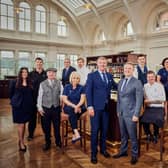 One of the hallmarks of the Belfast hotel’s success is that over 20% of its staff have been employed for more than five years with the head of concierge there since it opened in September 2017. Pictured are some of the dedicated staff