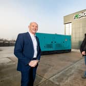 Tandragee-based electrical engineering company, Rapid Power Generation is creating 15 jobs in efforts to meet global demand for its generator sets. Pictured are George McKinney, director of Scaling, Invest NI and Brendan Taaffe, director, Rapid Power Generation