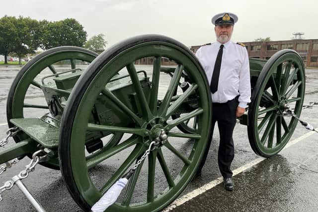 Lieutenant Commander Paul 'Ronnie' Barker standing next to the gun carriage that is going to be used to carry Queen Elizabeth II's coffin during the funeral procession, while being towed by the Royal Navy sailors. Picture date: Wednesday September 14, 2022.
