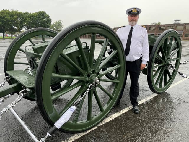 Lieutenant Commander Paul 'Ronnie' Barker standing next to the gun carriage that is going to be used to carry Queen Elizabeth II's coffin during the funeral procession, while being towed by the Royal Navy sailors. Picture date: Wednesday September 14, 2022.