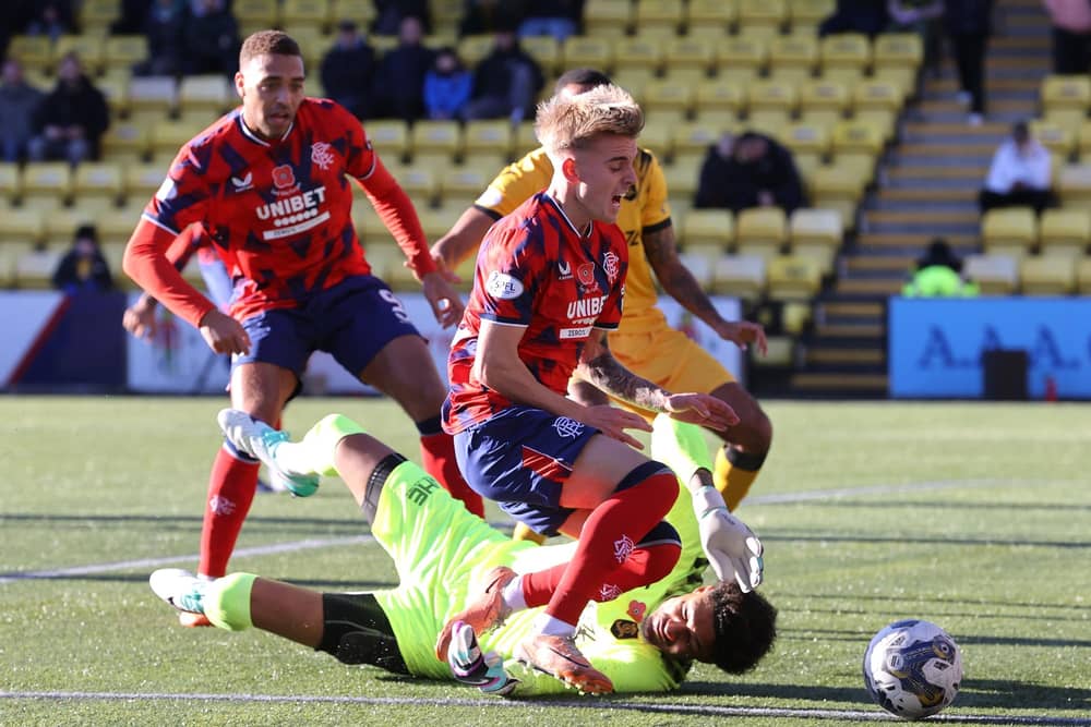Livingston goalkeeper Shamal George fouls Rangers' Northern Ireland-born Ross McCausland to concede a penalty during the cinch Premiership match at the Tony Macaroni Arena. (Photo by Steve Welsh/PA Wire)